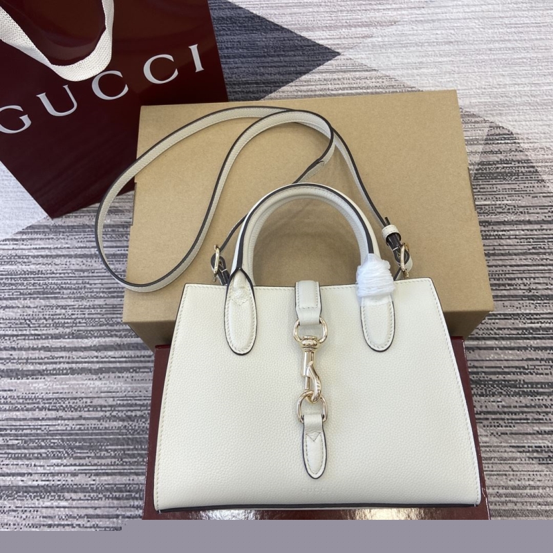 G*u*i top handle bags